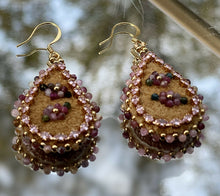 Load image into Gallery viewer, Teardrop shaped earrings with 2.5 mm tourmaline stone flowers and edging, size 11 24k gold seed bead centers and edging, 24k gold plated light rose crystal marquise chain. On moose skin w/light shiny pink backing. 24k gold plated hooks.