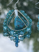 Load image into Gallery viewer, Turquoise teardrop center w/dentalium, 1 mm faceted blue tone stones, Charlotte cut beads in size 11 and 15, lt turquoise 4mm Swarovski crystals, and lt blue daggers. On hypoallergenic hooks.