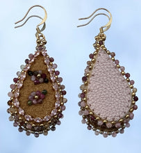 Load image into Gallery viewer, Teardrop shaped earrings with 2.5 mm tourmaline stone flowers and edging, size 11 24k gold seed bead centers and edging, 24k gold plated light rose crystal marquise chain. On moose skin w/light shiny pink backing. 24k gold plated hooks.